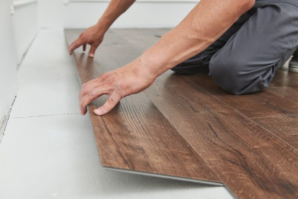 vinyl flooring being installed